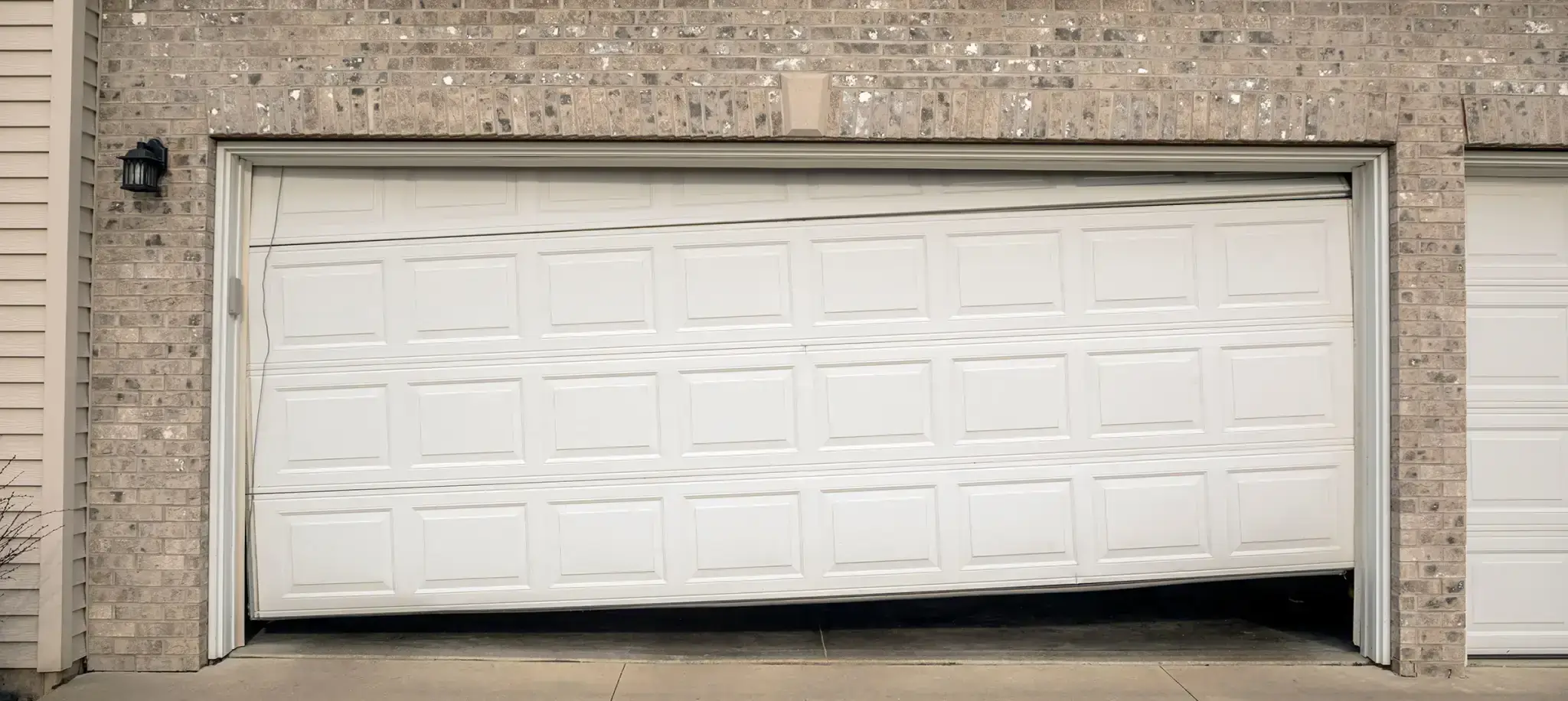 misaligned-tracks-garage-door